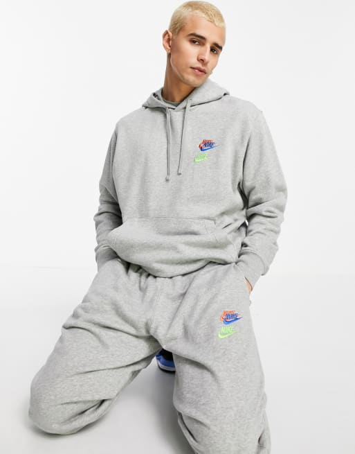 Nike Essential fleece multi logo tracksuit in grey | ASOS