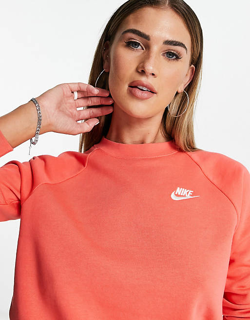 Nike Essential tracksuit in coral pink