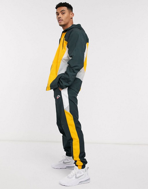 Nike Heritage tracksuit in yellow/green