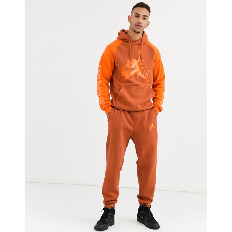 Orange nike outlet jumpsuit