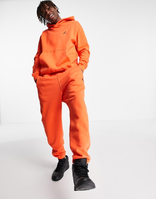 Nike orange store and grey tracksuit