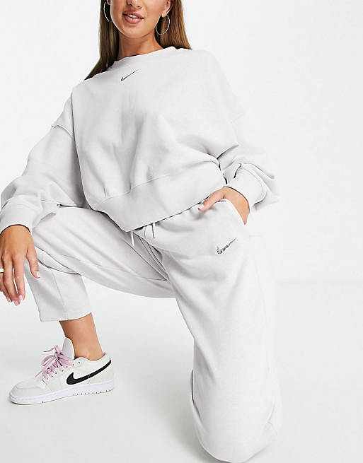 Nike Lounge essential fleece tracksuit in grey marl