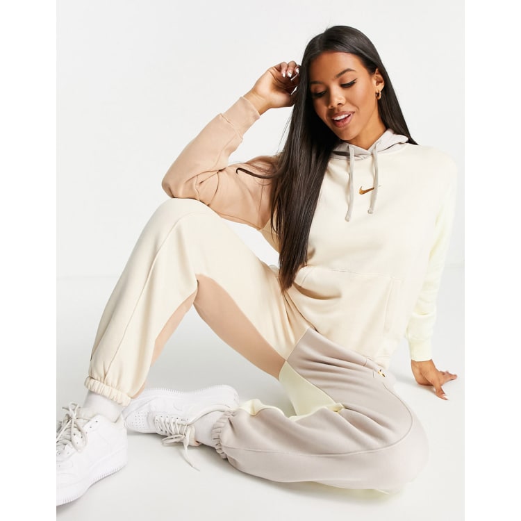 Nike metallic discount swoosh pastel tracksuit