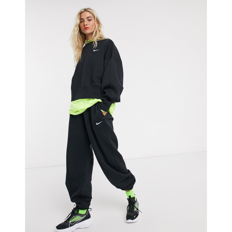 Nike Mini swoosh oversized black tracksuit ASOS