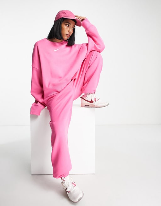 Nike mini swoosh oversized tracksuit in pinksicle