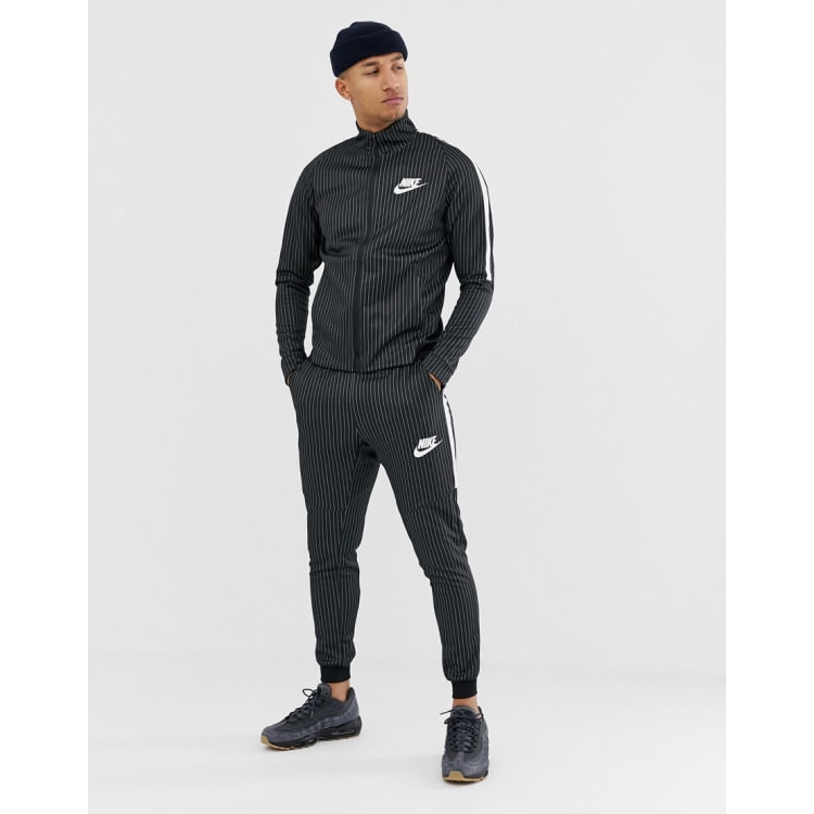 Nike stripe tracksuit cheap bottoms