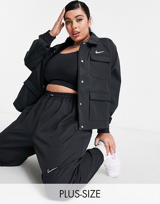 Nike Swoosh Plus woven jacket in black with utility pockets