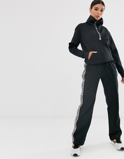 Nike Pro Training half zip sweatshirt and trousers set in black | ASOS