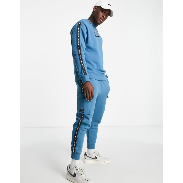 Nike taped poly store tracksuit