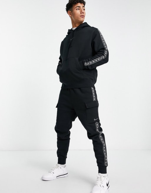 Nike swoosh taped store tracksuit