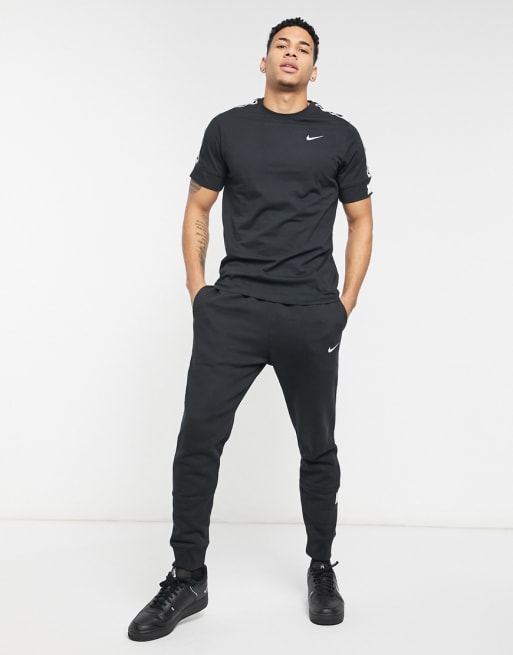 Nike Repeat Pack logo taping tracksuit in black | ASOS