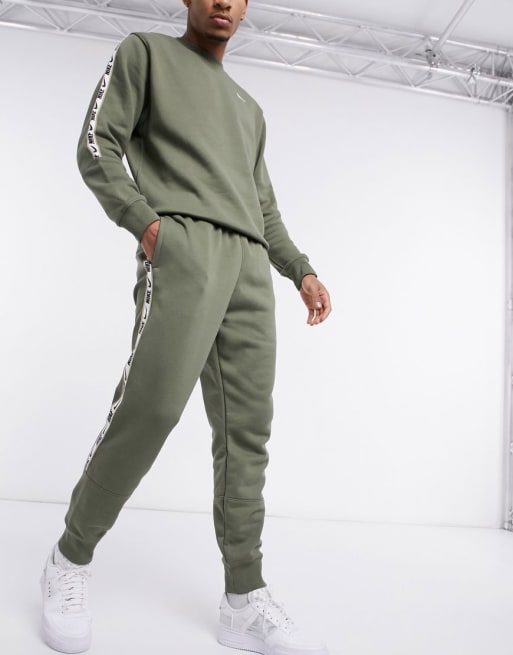 Nike Repeat Pack logo taping tracksuit in khaki ASOS