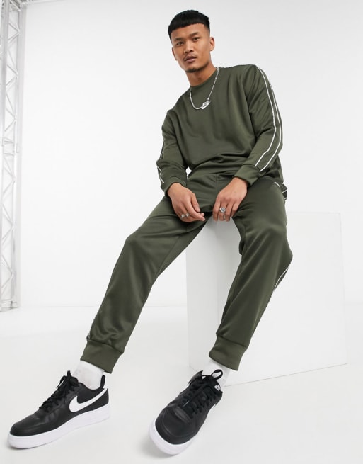 Nike Repeat Pack polyknit logo taping tracksuit set in khaki | ASOS