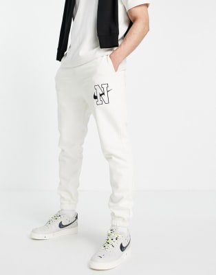 womens cream nike tracksuit