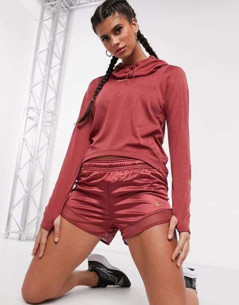 Nike Running – Kombiset mit Oberteil und Shorts in Rosa