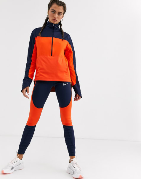 Nike Running – Oberteil mit kurzem Reißverschluss und Leggings mit Farbblockdesign