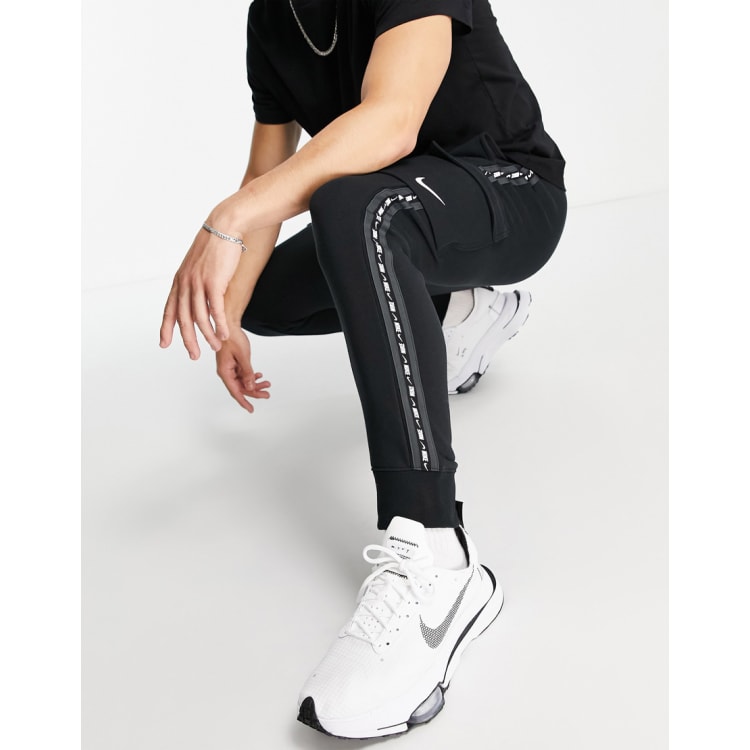 Nike - Veste longue en polaire technique avec bandes 3M - Gris, ASOS