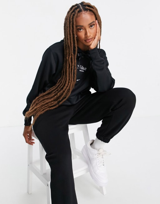 Nike – Svart träningsoverall i oversize med dragsko
