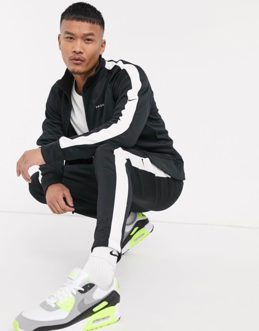 Black nike best sale tick tracksuit