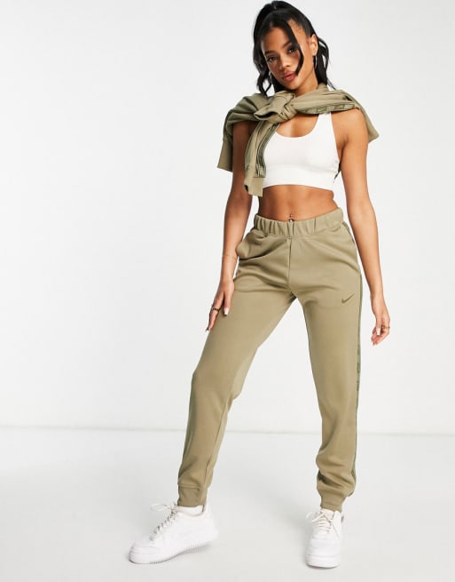 Nike swoosh tape tracksuit in matte olive | ASOS