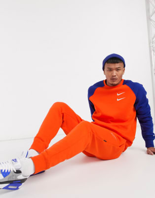 nike orange and black tracksuit