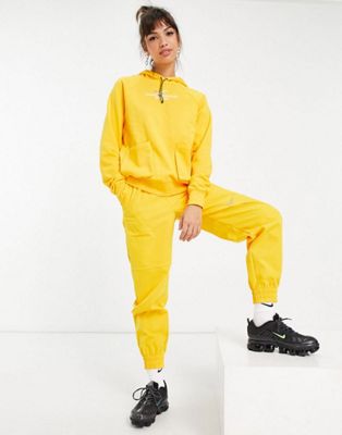 Nike Swoosh woven tracksuit in gold yellow | ASOS