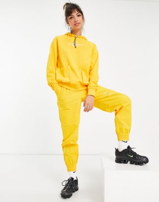 Nike tracksuit yellow hotsell