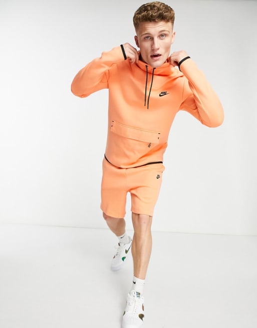 Orange on sale nike tech