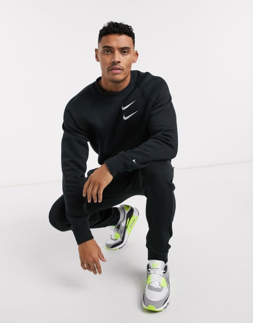 Nike Trainingspak met swoosh in zwart ASOS