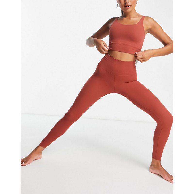 Activewear Donna Nike - Yoga Luxe - Completo rosso granata scuro