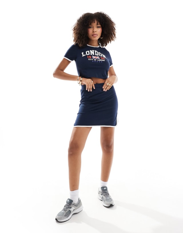 Pieces - sport core 'london' cropped t-shirt and mini skirt co-ord in navy and whi