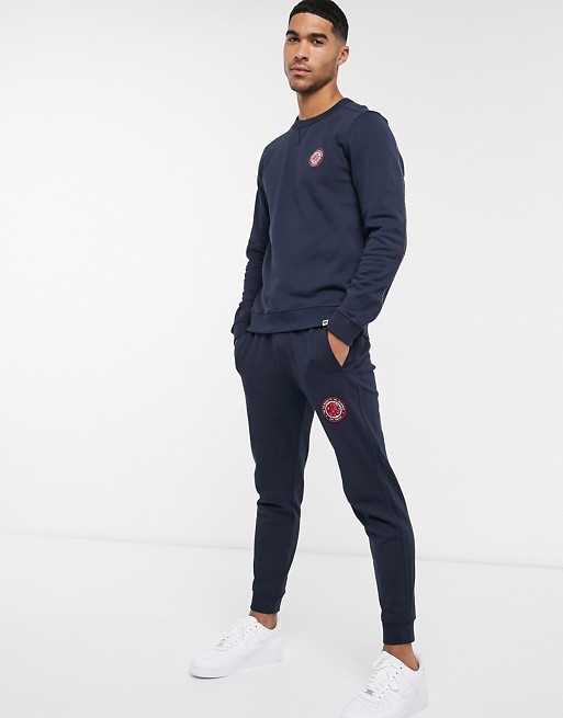 Pretty Green live forever badge logo tracksuit set in navy