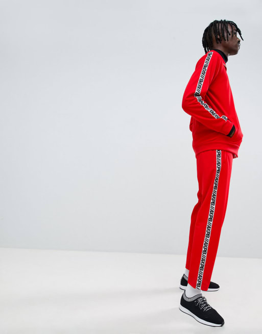 Pull&Bear – Czerwony dres z logo na bocznym pasku – Dostępny tylko w ASOS