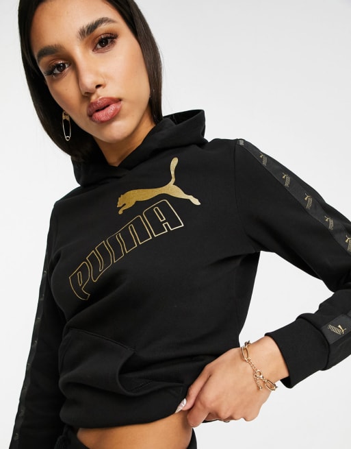 PUMA – Amplified – Svart och guldfärgad träningsoverall