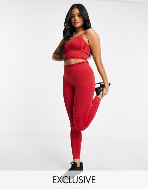 Puma - Training - Brassière de sport à lanières rouges - Rose - Exclusivité  ASOS