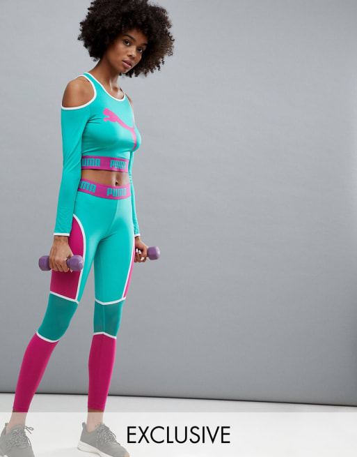 Puma – Kurzes, langärmliges Oberteil mit Zierausschnitten und Leggings mit Netzstoffeinsätzen in Grün, exklusiv bei ASOS