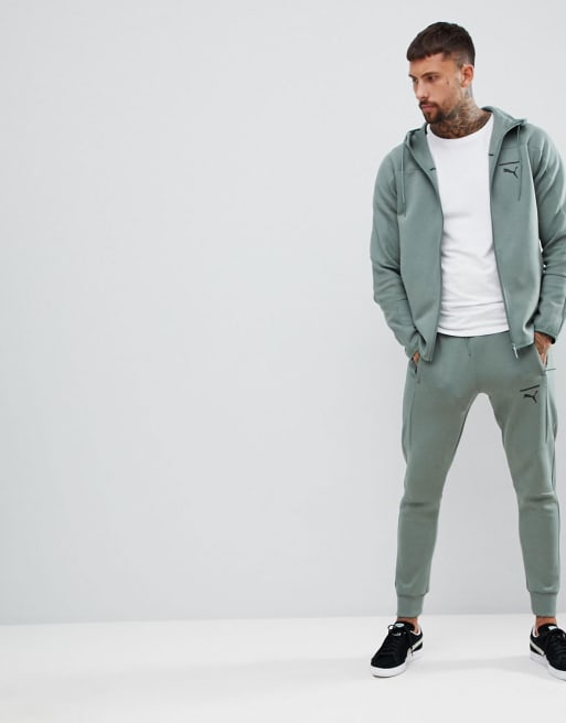 Dark green puma on sale tracksuit