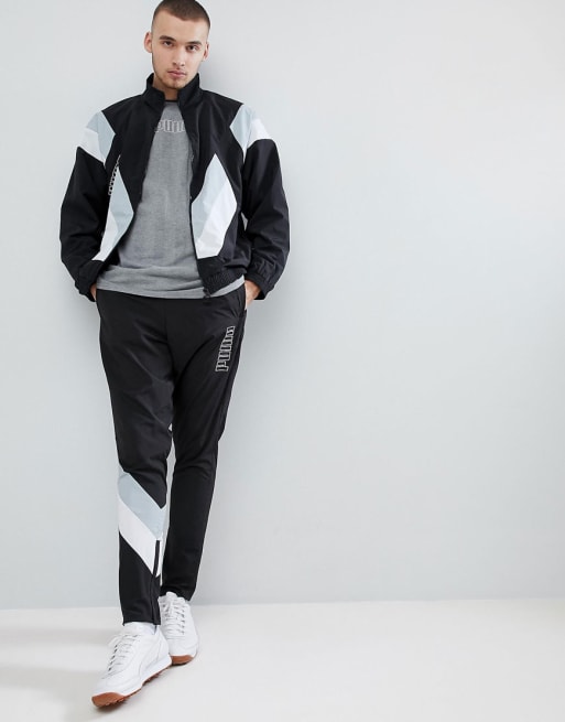 Puma Svart träningsoverall i Heritage-modell