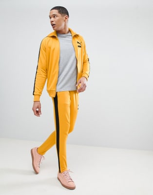 black and yellow puma tracksuit