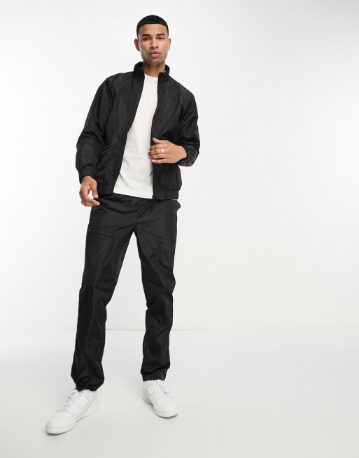 Rains nylon track jacket and pants in black | ASOS