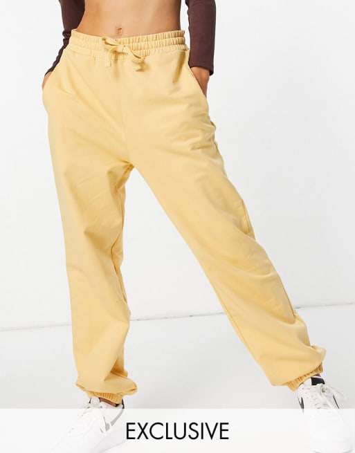 Reclaimed Vintage inspired unisex jogger & hoodie in yellow