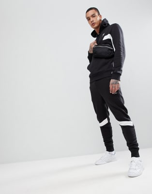 Reebok Slim Fit Tracksuit in Black | ASOS