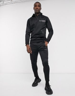 Religion Tall polycot tracksuit with rubbersised logo in black | ASOS