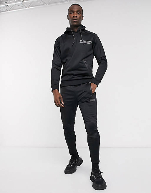Religion Tall polycot tracksuit with rubbersised logo in black | ASOS
