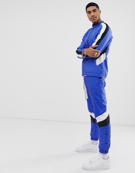 Religion - Trainingspak met kleurvlakken