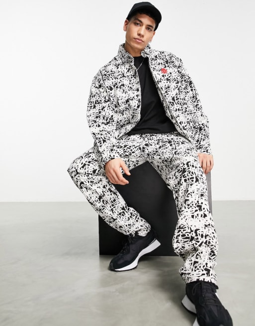 Roadies oversized jacket and trouser co-ord in graffiti print