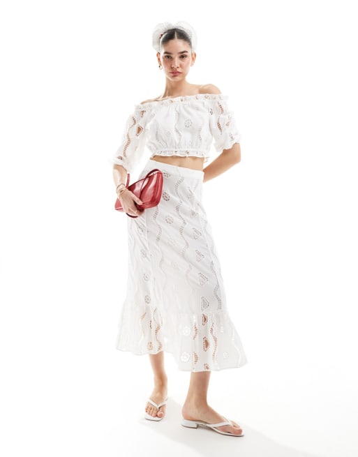 Scalpers embossed skirt and top set in white