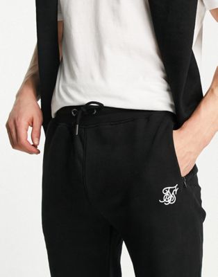 Siksilk co-ord set in black with flight toggle