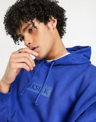Siksilk co-ord set in blue with logo badge