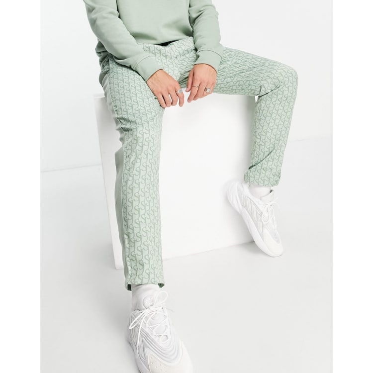 Sixth June tracksuit in dusty green with monogram logo print